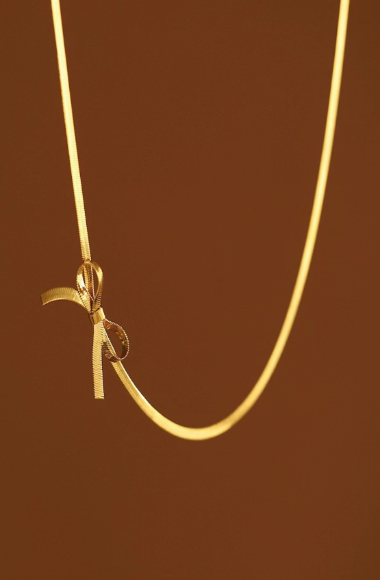 Silver Plated Stainless Steel Antitarnish Bow Chain Necklace